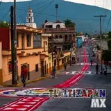 Las calles de Tlaltizapán, Morelos adornadas con tapetes de aserrín