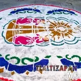 El Santísimo Sacramento plasmado en un tapete de aserrin en Tlaltizapán, Morelos