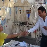 El presidente en turno dando la bienvenida a los artesanos en la feria