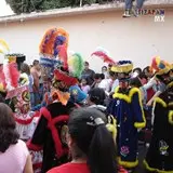 Trajes de chinelo que portan las personas en el carnaval 2006