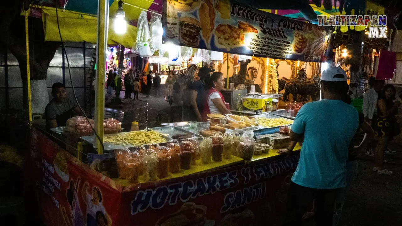 Puesto de Frituras y postres en la feria por el carnaval.