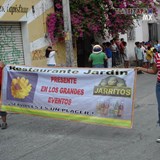 Lonas con propaganda de los comercios en el desfile del carnaval 2006